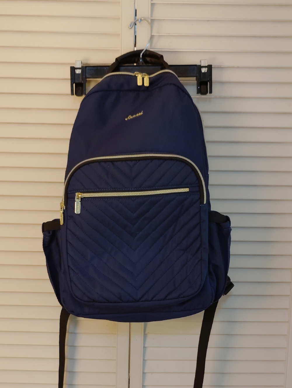 Lovevook Classic Quilted Navy Backpack with Gold Accents
